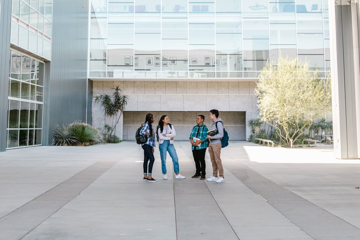 College students standing together on a modern campus